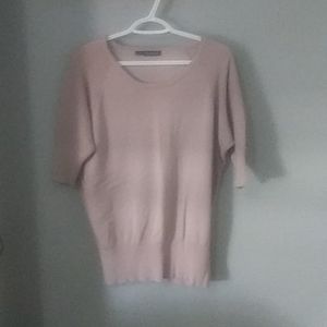 Beige sweater still in New shape.